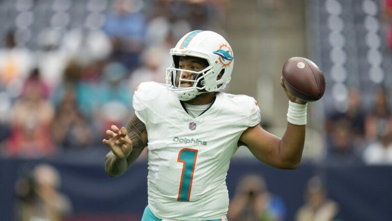 Miami's Tua Tagovailoa gets ready to throw a football.